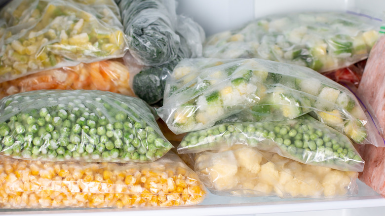 plastic bags of frozen vegetables