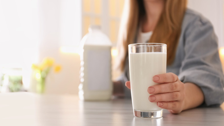 woman with glass of milk