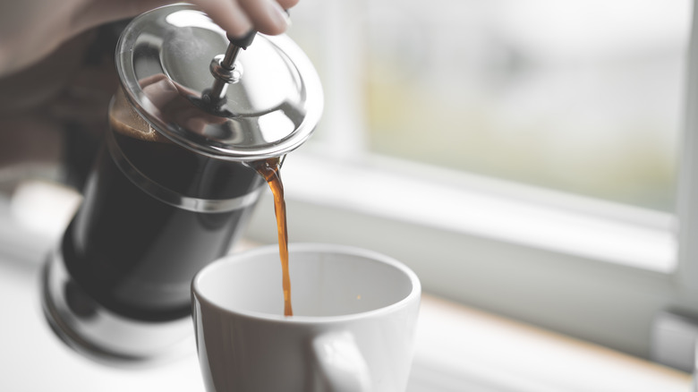 pouring coffee from French press