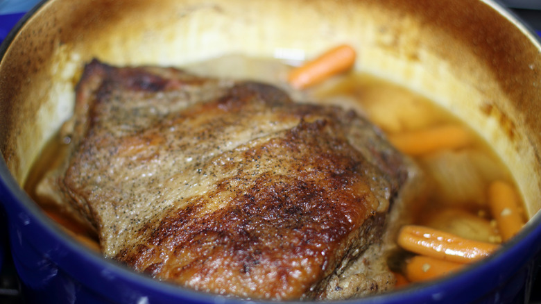 Beef pot roast cooked in a Dutch oven