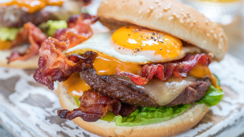 egg topped bacon cheeseburger