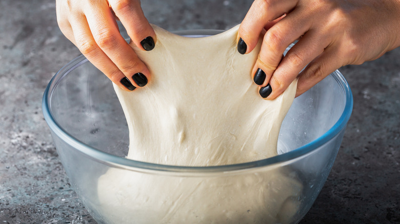 stretching and folding bread dough