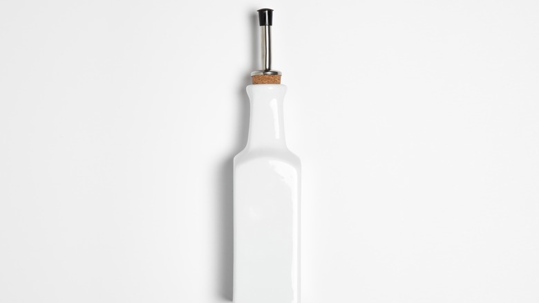 White ceramic olive oil dispenser