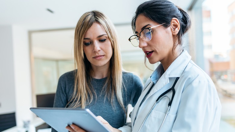 woman and doctor talking