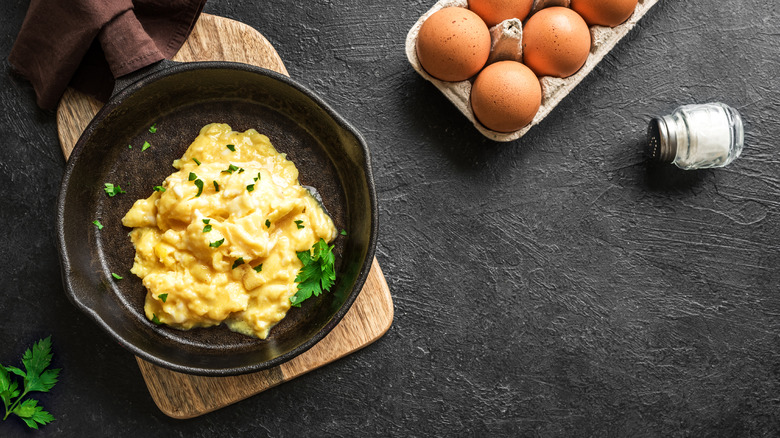 Scrambled eggs in a cast iron pan