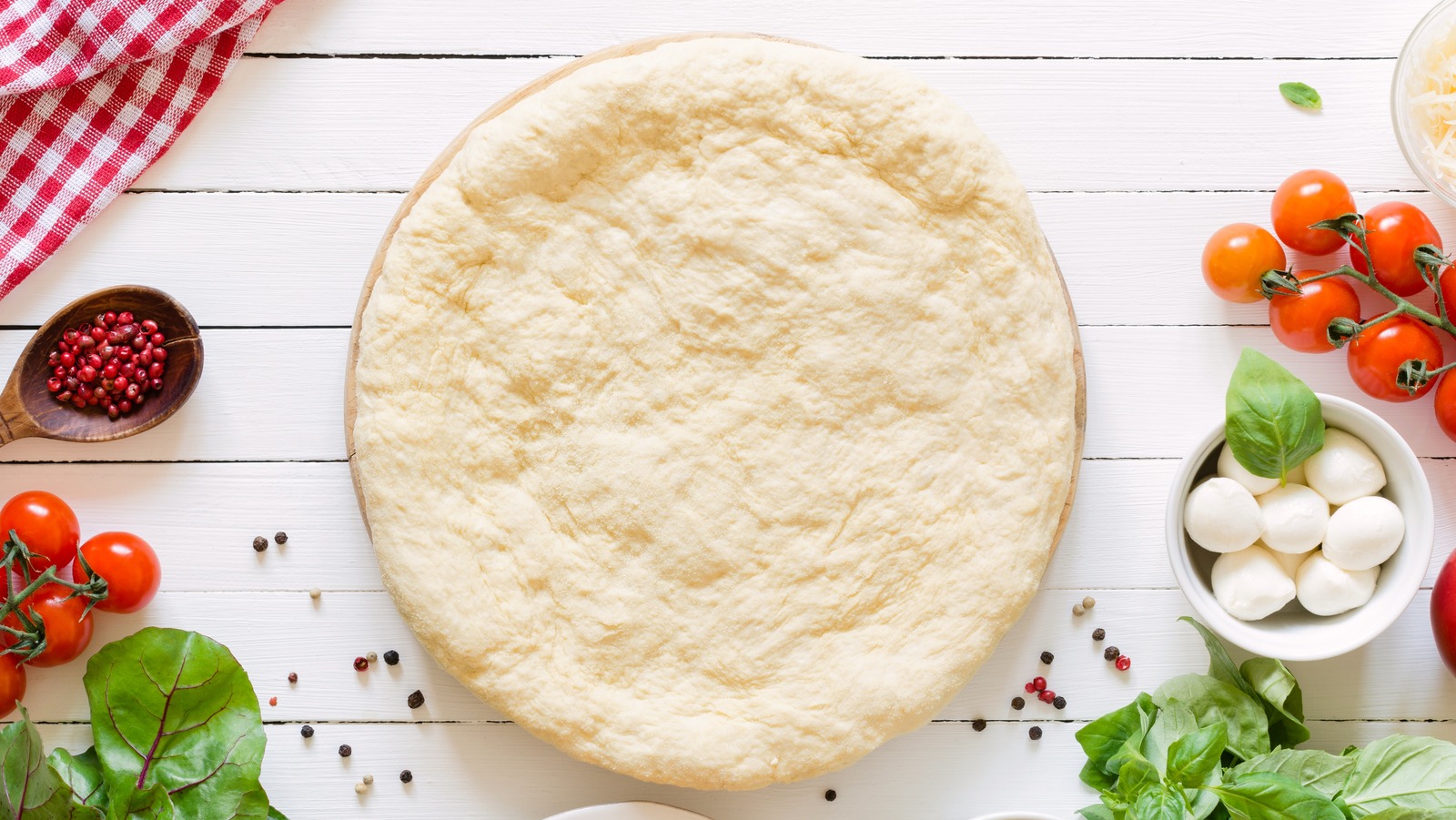 https://www.tastingtable.com/img/gallery/the-important-step-to-follow-when-using-premade-pizza-dough/l-intro-1672857194.jpg