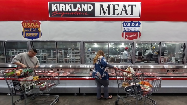 costco shoppers in the meat section