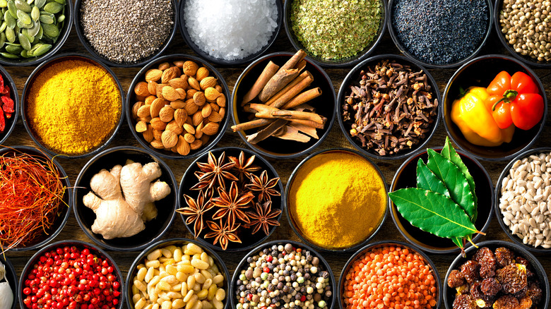 Various colorful spices in bowls