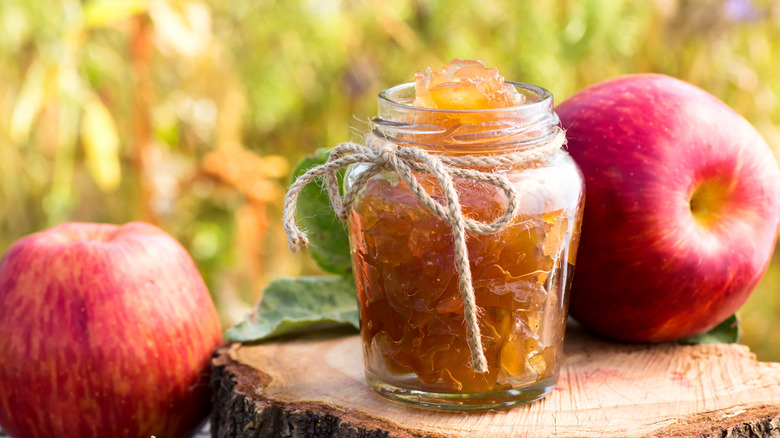 jarred apples on wood 