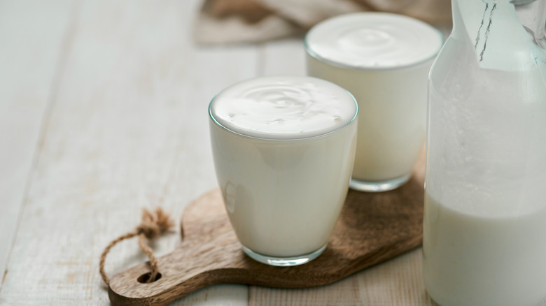 Pitcher and glasses of buttermilk