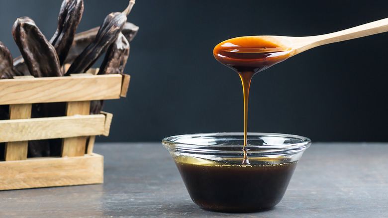 Small bowl of molasses.