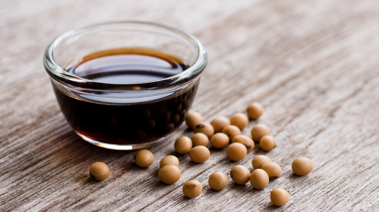 Glass dish of soy sauce