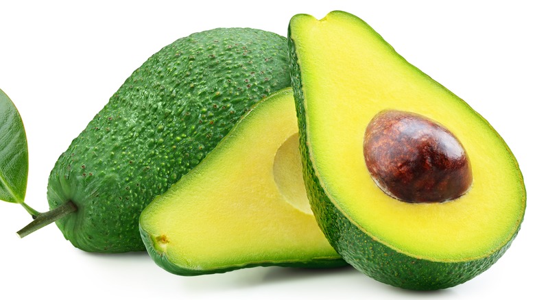 Cut and halved avocado