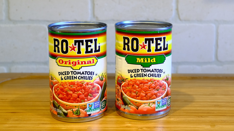 Cans of Ro-Tel on table