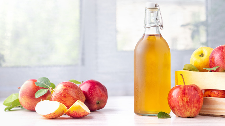 apple cider vinegar and apples.