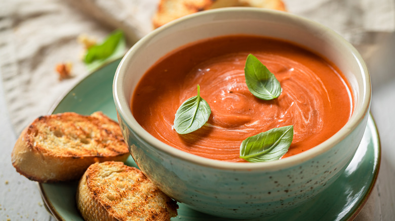 tomato soup in white bowl