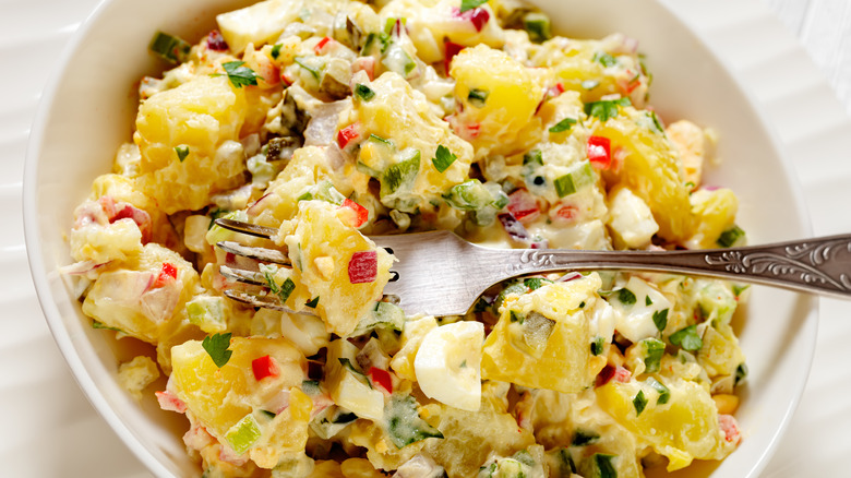 Potato salad mixed with peppers