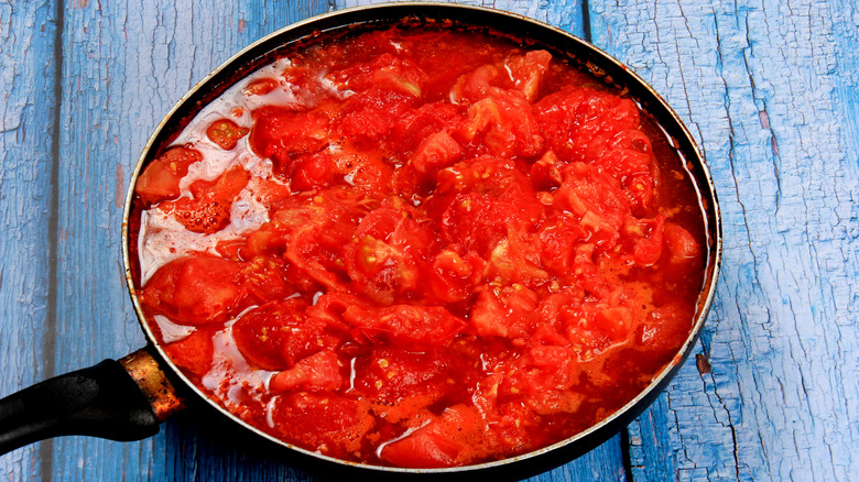 Sautéed tomatoes in a pan