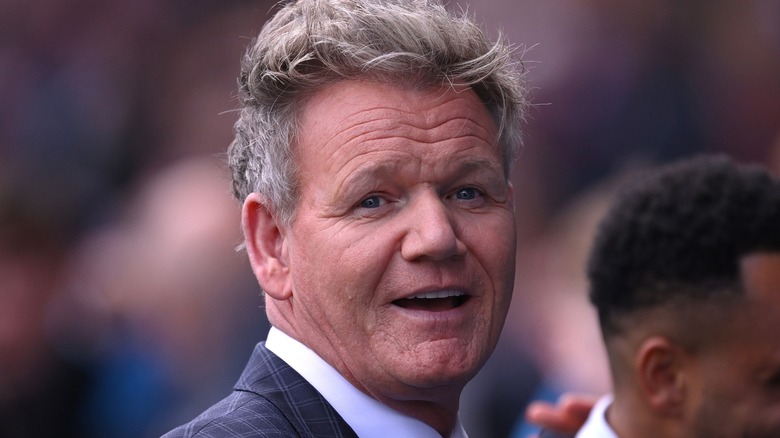 A close-up of a smiling Gordon Ramsay