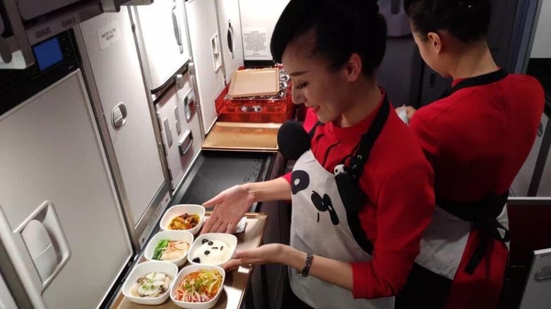 Sichuan attendants preparing airline meal