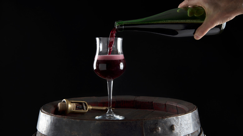 Pouring a glass of Lambrusco