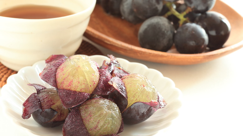 Peeled Kyoho grapes on plate