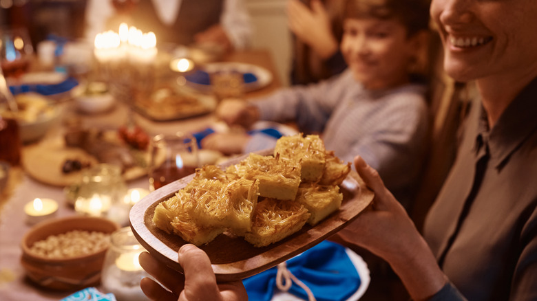 family passing kugel