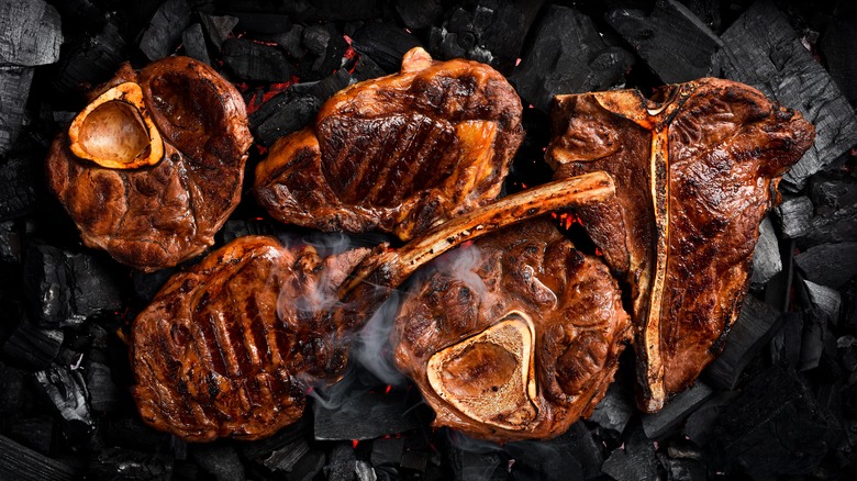 cooked tomahawk and porterhouse steaks