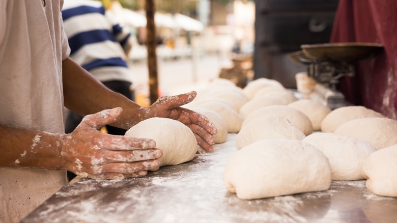 kneading bread dough