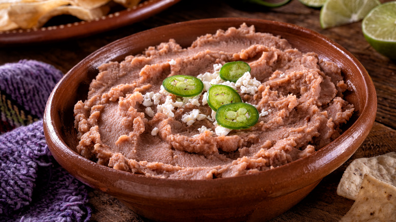 Refried beans with jalapeños and cheese