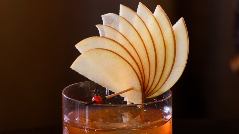 apple garnish on cocktail