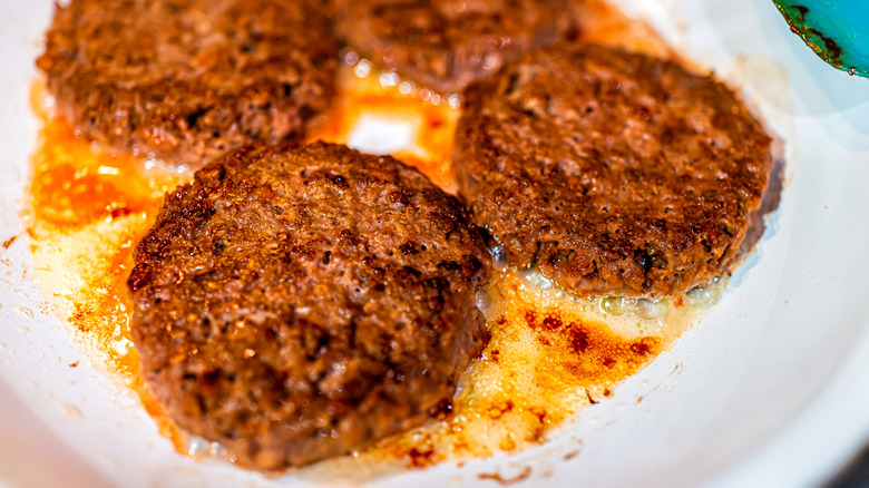 smashed impossible burgers in pan