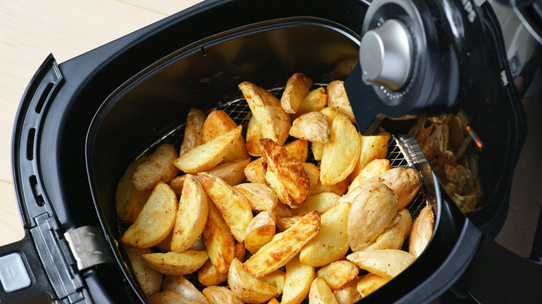 air fryer with fries in basket