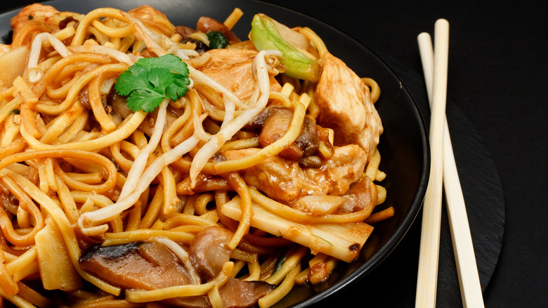 Chicken chow mein with chopsticks