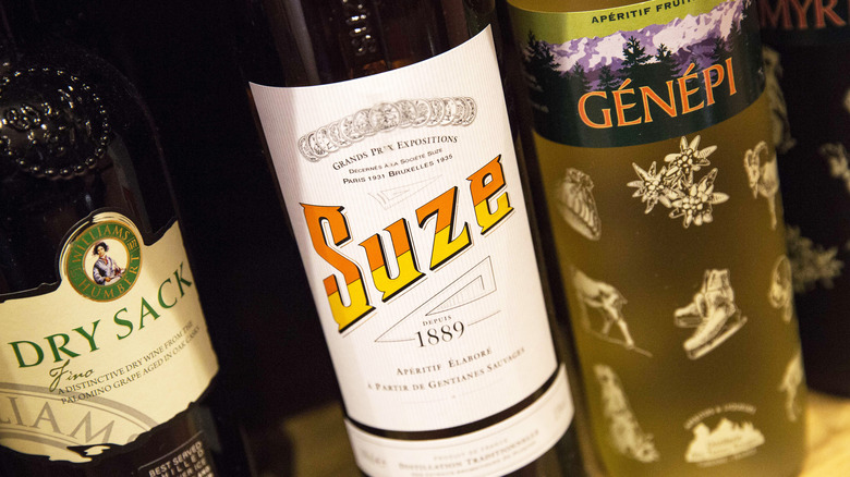 Close-up of a bottle of Suze on a shelf