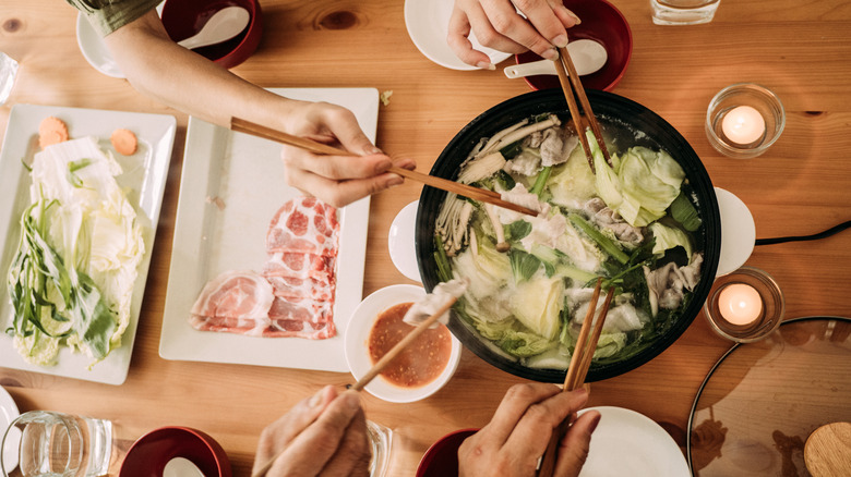 People eating hot pot