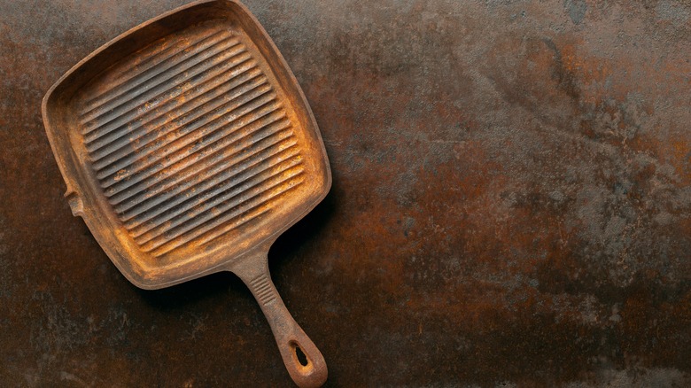 rusty cast iron skillet