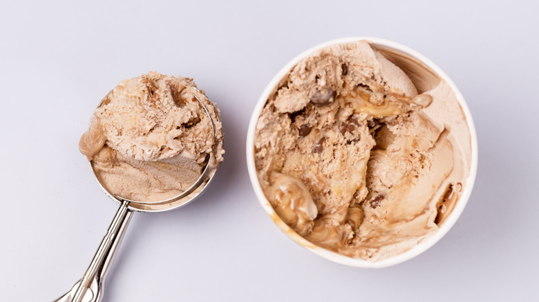 https://www.tastingtable.com/img/gallery/the-koozie-trick-to-keep-your-ice-cream-pint-from-melting/intro-1692756799.jpg