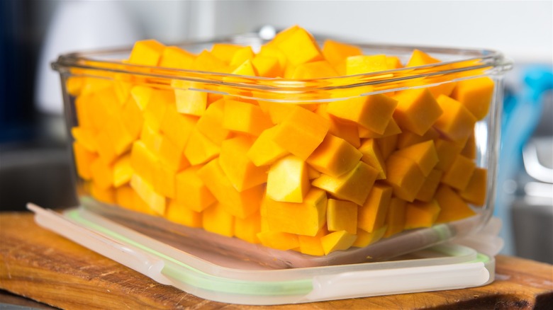 Cubed butternut squash in a container