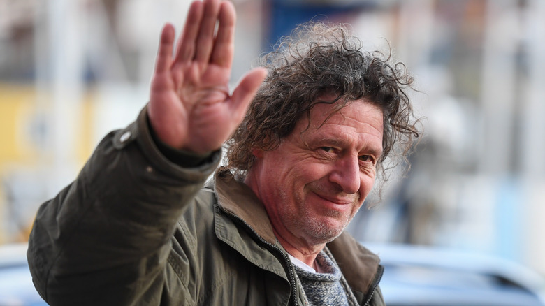 Chef Marco Pierre-White waving