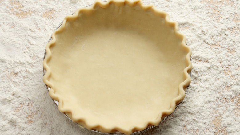 uncooked pie crust in pan