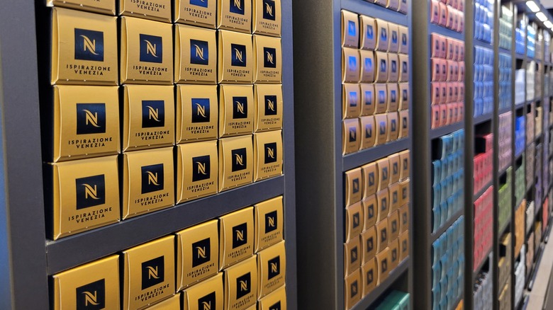 shelves of Nespresso pods