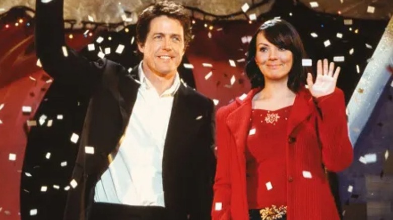 Hugh Grant as the Prime Minister and Martine McCutcheon as Natalie waving in "Love Actually"