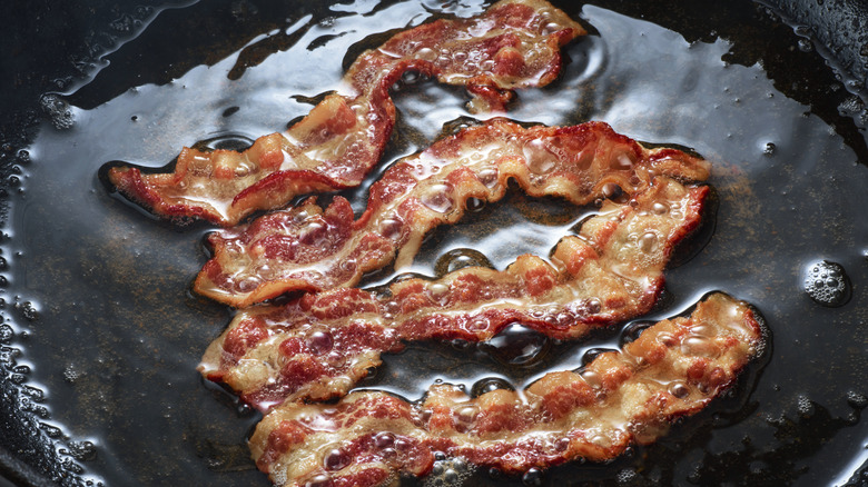 Frying bacon