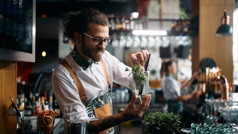 barman making drink