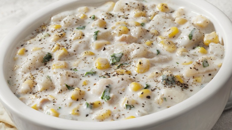 Closeup of a bowl of creamy corn and potato chowder