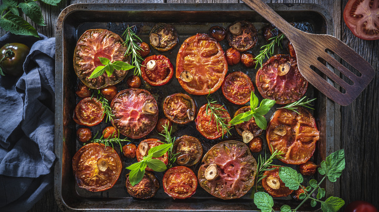 Roasted tomatoes on baking sheet