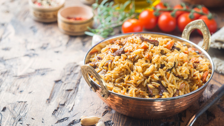 lamb pilaf in a silver bowl