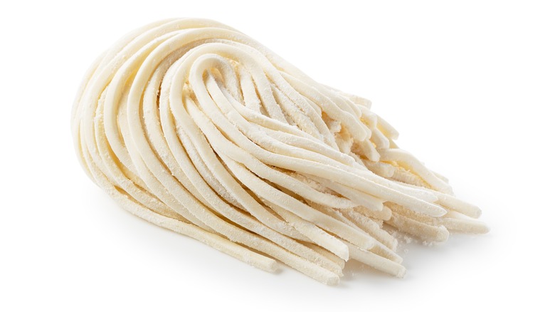 isolated fresh udon noodles