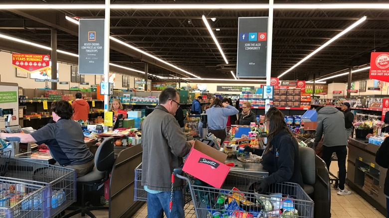 a busy Aldi checkout area